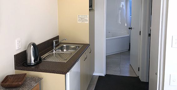 1-bedroom spa kitchenette and bathroom